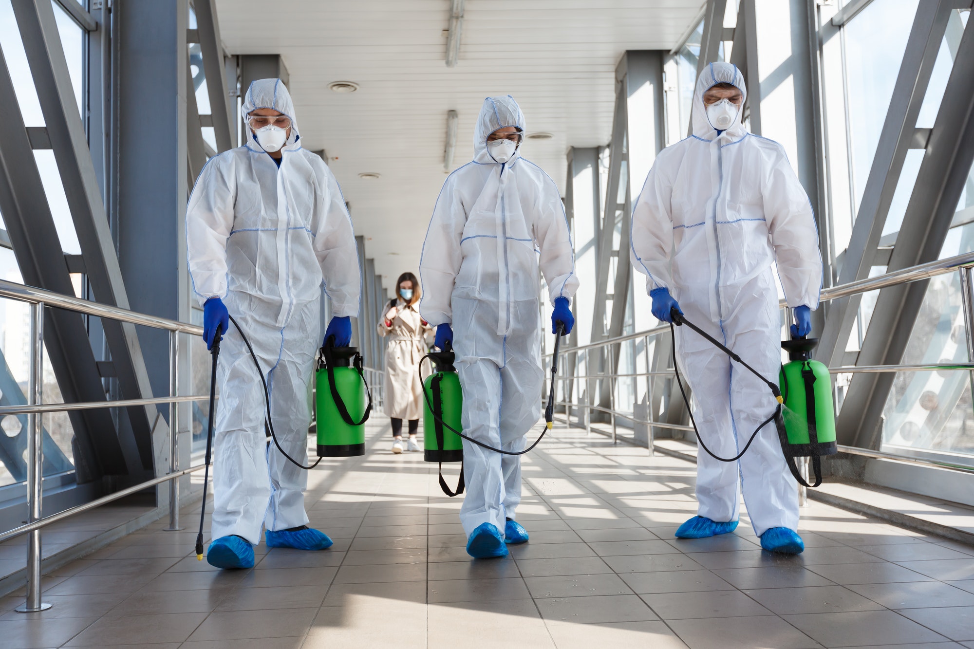 Specialist in hazmat suits cleaning disinfecting coronavirus