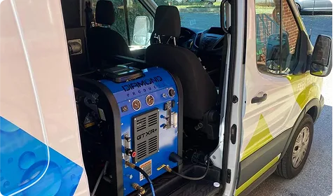 Diamond Products GTXR+ truck-mounted carpet cleaning system in Xtreme Cleans van